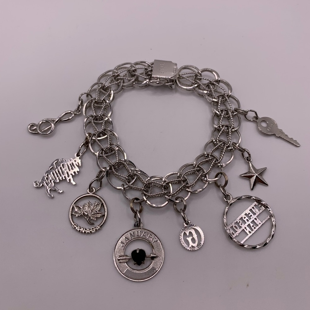 #009 Vintage 925  sterling silver charm bracelet
